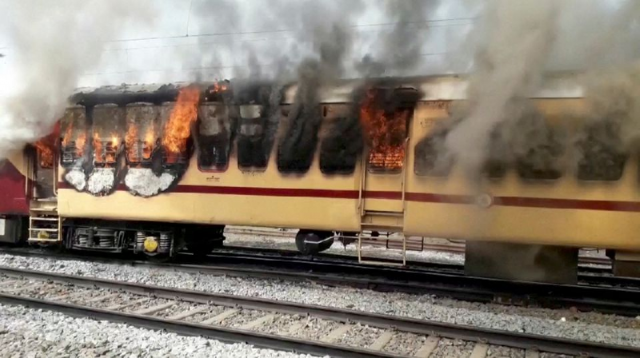 a train coach burns following a protest in gaya bihar india january 26 2022 photo reuters a train coach burns following a protest in gaya bihar india january 26 2022 photo reuters