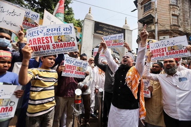 people holding placards shout slogans demanding the arrest of bharatiya janata party bjp member nupur sharma for her blasphemous comments on a street in mumbai india june 6 2022 photo reuters