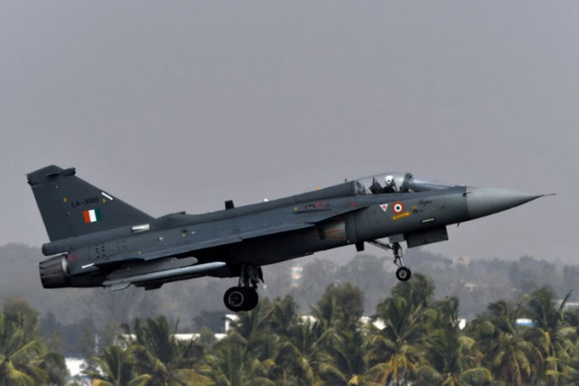 an indian air force iaf light combat aircraft tejas flies during the aero india 2021 air show at yelahanka air base in bengaluru india february 3 2021 reuters samuel rajkumar an indian air force iaf light combat aircraft tejas flies during the aero india 2021 air show at yelahanka air base in bengaluru india february 3 2021 reuters samuel rajkumar
