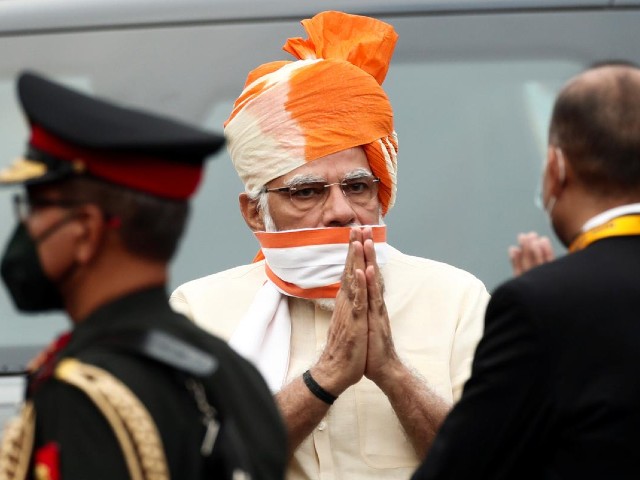 indian prime minister narendra modi greets officers as he arrives to attend independence day celebrations at the historic red fort in delhi india august 15 2020 photo reuters