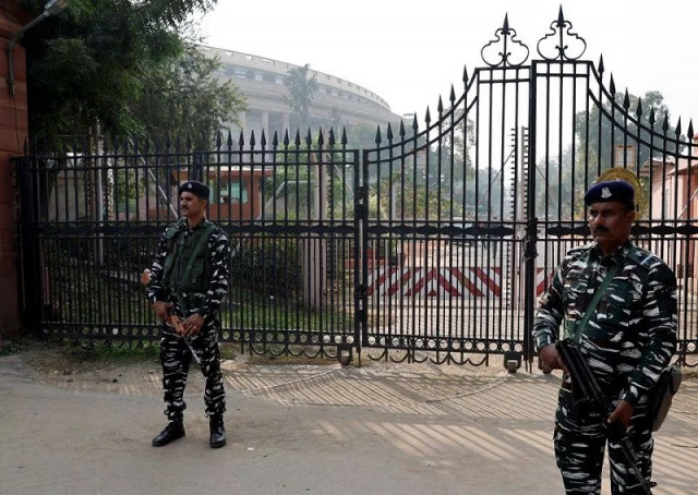 security force personnel stand guard outside the parliament premises in new delhi india december 13 2023 photo reuters