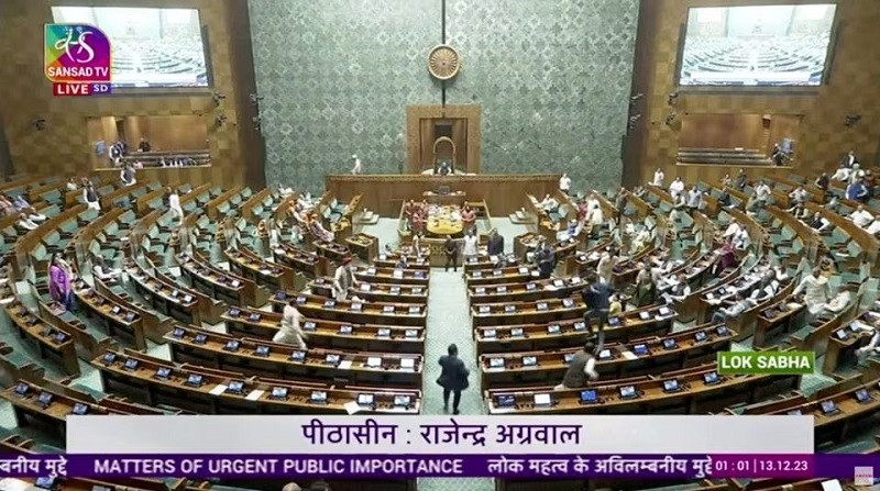 a man jumps into the lawmakers area in the lower house of the indian parliament in new delhi india december 13 2023 photo reuters