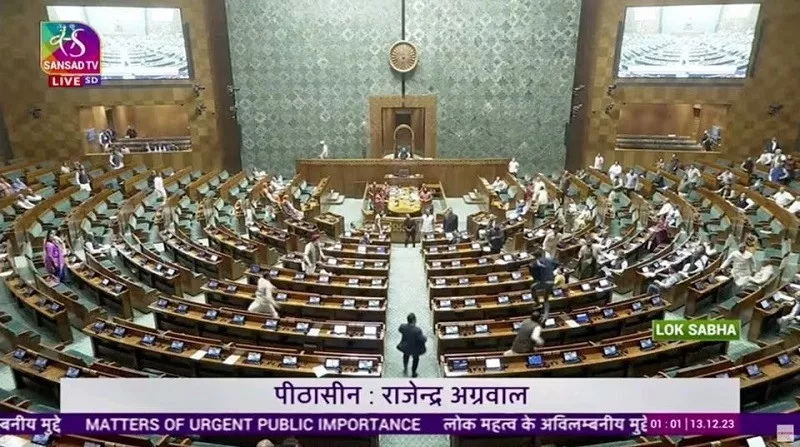 a man jumps into the lawmakers area in the lower house of the indian parliament in new delhi india december 13 2023 photo reuters a man jumps into the lawmakers area in the lower house of the indian parliament in new delhi india december 13 2023 photo reuters