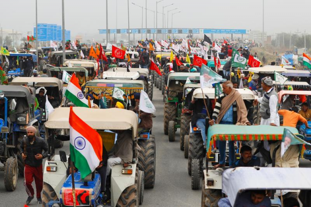 farmers participate in a tractor rally to protest against the newly passed farm bills on a highway on the outskirts of new delhi india january 7 2021 photo reuters farmers participate in a tractor rally to protest against the newly passed farm bills on a highway on the outskirts of new delhi india january 7 2021 photo reuters