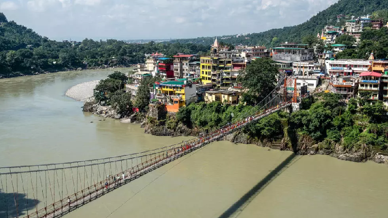 the lakshman jhula footbridge over the ganges river in india made famous by the beatles in the 1960s photo afp file