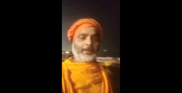the hardline in the 45 second video can be seen hurling threats at muslims saying we will not spare them screengrab the hardline in the 45 second video can be seen hurling threats at muslims saying we will not spare them screengrab