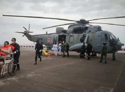 indian navy searches for 77 missing from barge sunk by cyclone