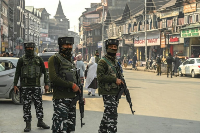 indian paramilitary troops stand guard on a street in srinagar afp file indian paramilitary troops stand guard on a street in srinagar afp file