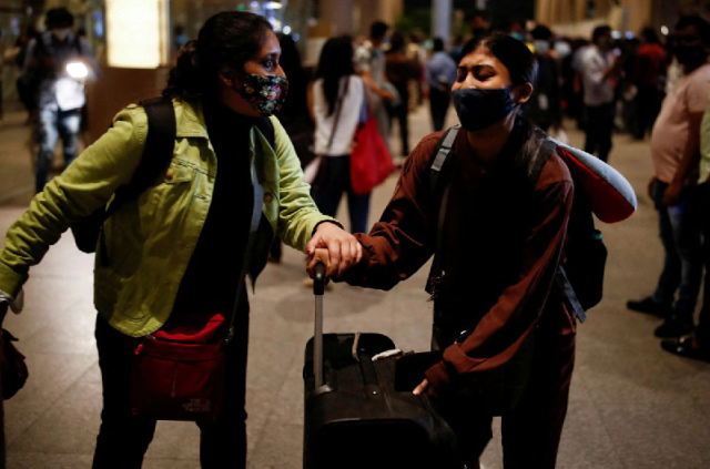 students react as they leave the chhatrapati shivaji maharaj international airport after a special air india flight carrying stranded indian citizens from ukraine landed in mumbai india photo reuters file students react as they leave the chhatrapati shivaji maharaj international airport after a special air india flight carrying stranded indian citizens from ukraine landed in mumbai india photo reuters file