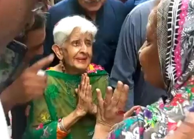 Photo of 92-year-old Indian woman gets rousing welcome at her ancestral home