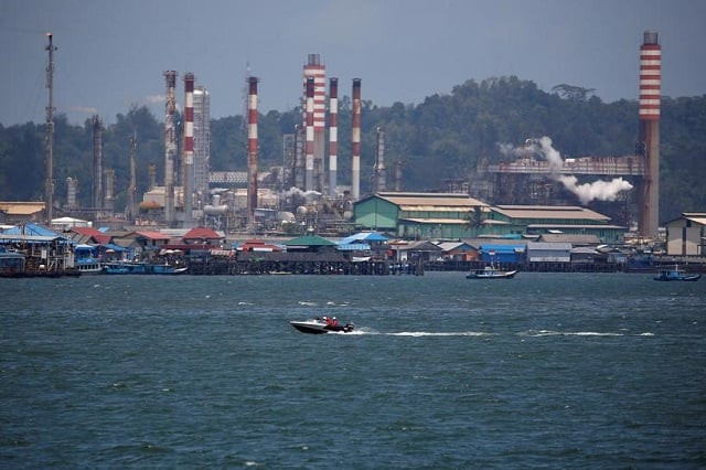 people sit on a boat driving through balikpapan bay in east kalimantan province indonesia august 28 2019 photo reuters people sit on a boat driving through balikpapan bay in east kalimantan province indonesia august 28 2019 photo reuters