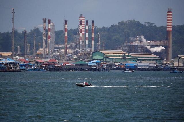 people sit on a boat driving through balikpapan bay in east kalimantan province indonesia august 28 2019 photo reuters