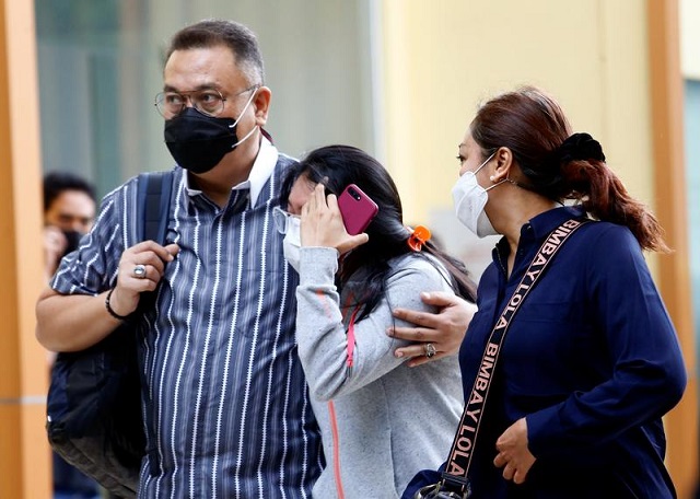 family members of a passenger of sriwijaya air flight sj 182 react at a hospital after the plane crashed into the sea off the jakarta coast in indonesia january 13 2021 photo reuters