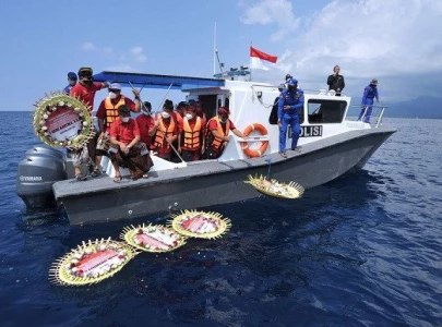 indonesia pledges new homes for relatives of doomed submariners