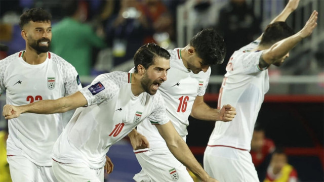 iran s players celebrate their win on penalties photo afp iran s players celebrate their win on penalties photo afp