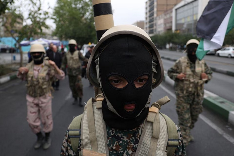 a member of basij paramilitary forces attends a rally in support of palestinians in tehran iran october 13 2023 photo reuters