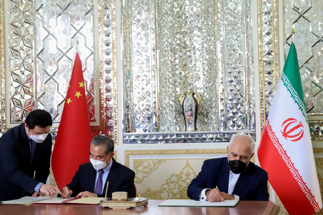 iran s then foreign minister mohammad javad zarif and chinese counterpart wang yi sign a 25 year cooperation agreement in tehran last year photo reuters iran s then foreign minister mohammad javad zarif and chinese counterpart wang yi sign a 25 year cooperation agreement in tehran last year photo reuters