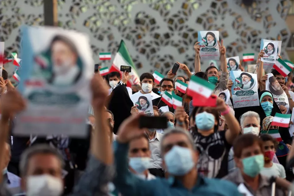 supporters of ebrahim raisi celebrate his presidential election victory in tehran iran june 19 2021 photo reuters supporters of ebrahim raisi celebrate his presidential election victory in tehran iran june 19 2021 photo reuters