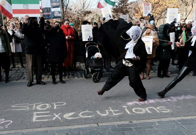 people demonstrate outside an iranian diplomat s residence in new york after a protester s execution photo afp