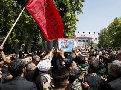 thousands bid farewell to iran s raisi ahead of burial
