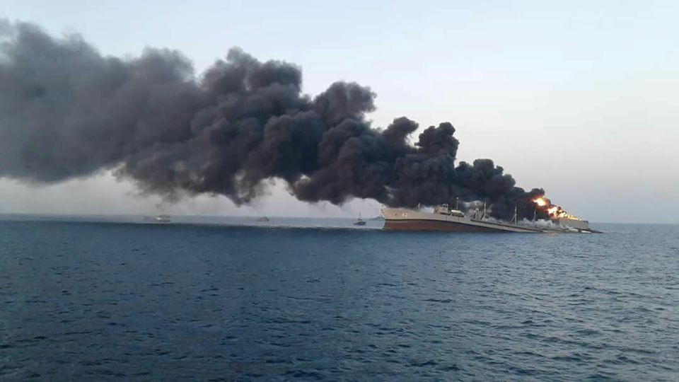smoke rises from iran navy s largest ship in jask port in the gulf iran june 2 2021 photo reuters
