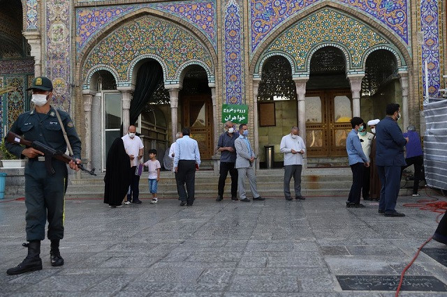 Iranians wait to vote at a polling station during presidential elections in Tehran, Iran June 18, 2021. PHOTO: REUTERS