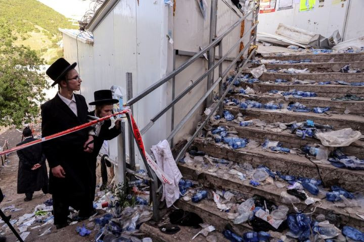 ultra orthodox jews look at stairs with waste on it in mount meron northern israel where fatalities were reported among the thousands of ultra orthodox jews gathered at the tomb of a 2nd century sage for annual commemorations that include all night prayer and dance april 30 2021 reuters ronen zvulun