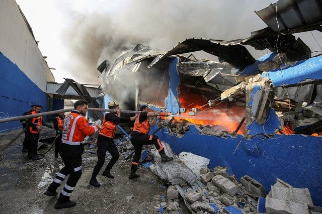 palestinian firefighters participate in efforts to put out a fire at a sponge factory after it was hit by israeli artillery shells according to witnesses in the northern gaza strip may 17 2021 photo reuters