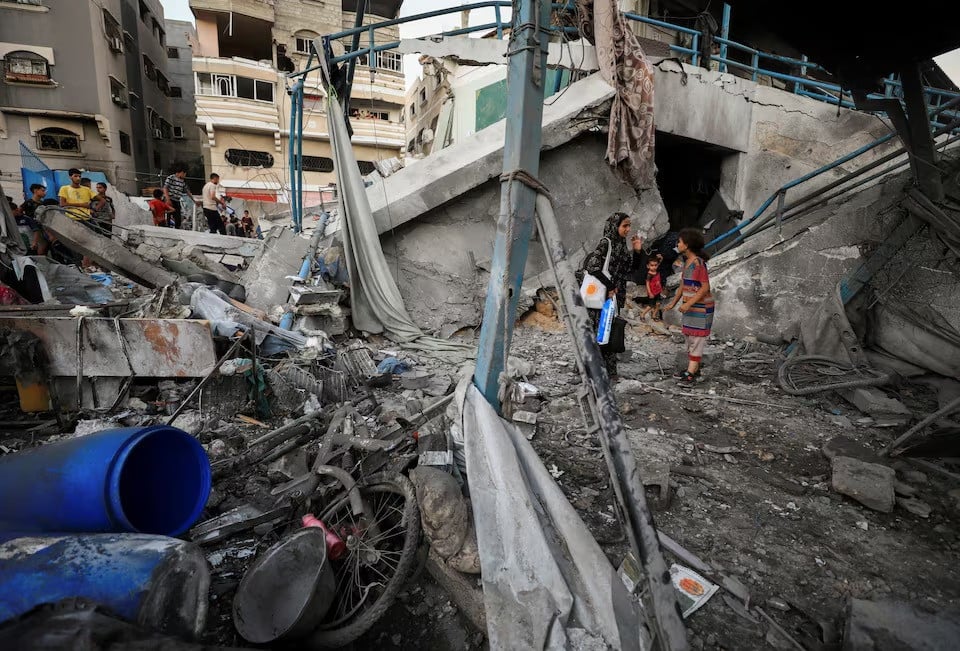 debris of un run school sheltering displaced people following an israeli strike in gaza city photo reuters