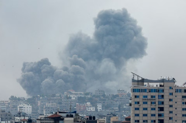 smoke rises following israeli strikes in gaza photo reuters