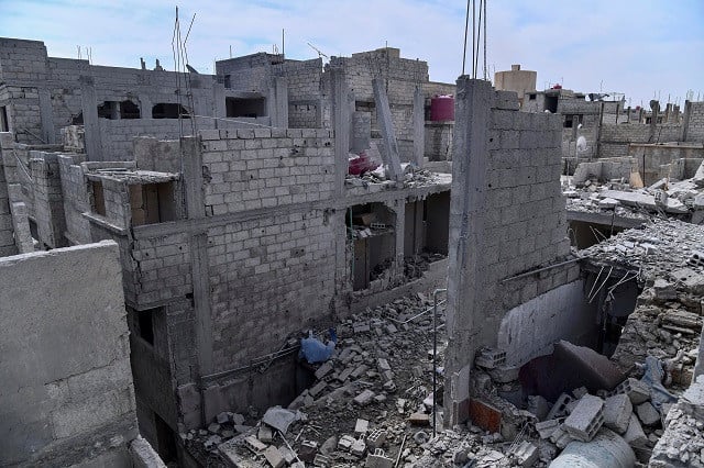 damaged buildings are shown after what syrian authorities said was an israeli air strike in the western suburbs of damascus syria in this handout released by state news agency sana on april 27 2020 photo reuters