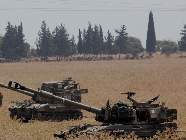 israeli army says it is involved in ongoing combat on northern border with lebanon photo afp