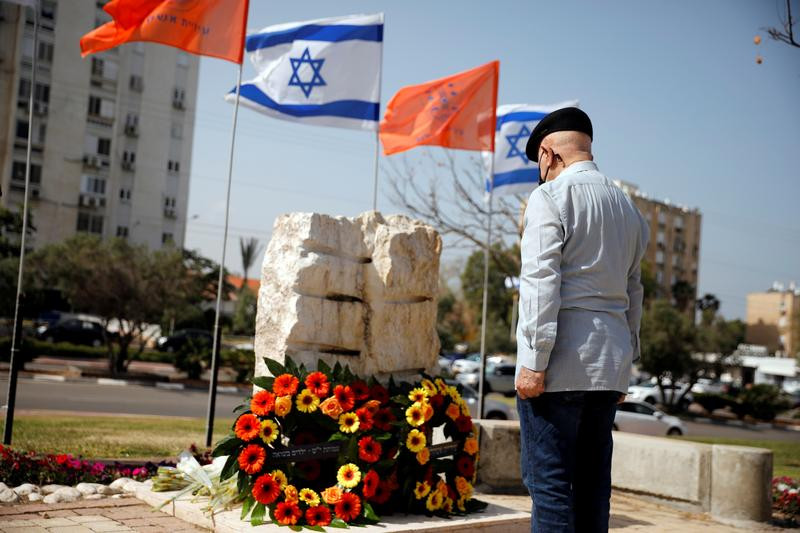 a man stands still as a two minute siren marking the annual israeli holocaust remembrance day is heard in ashkelon israel april 8 2021 photo reuters