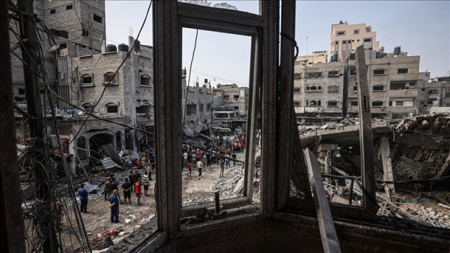 palestinians gather at the site of israeli strike photo anadolu agency palestinians gather at the site of israeli strike photo anadolu agency
