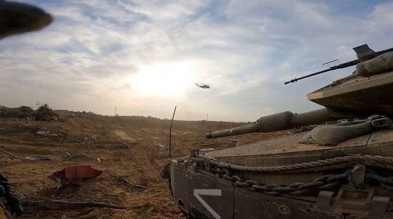 an israeli military vehicle operates at a location given as the gaza strip in this screen grab obtained from a video released on january 8 2024 photo reuters