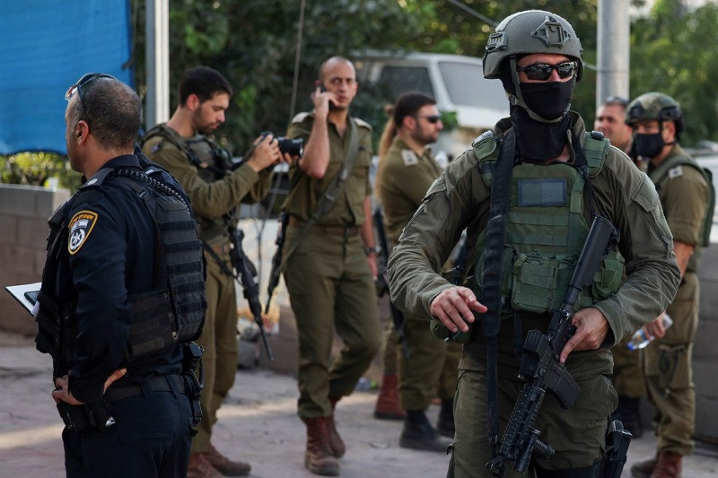israeli security forces stand guard at the site of a reported attack in the town of huwara in the occupied west bank on august 19 2023 photo afp