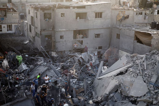 palestinians search for casualties at the site of israeli strikes on houses at the magazi refugee camp in central gaza strip november 5 2023 photo reuters palestinians search for casualties at the site of israeli strikes on houses at the magazi refugee camp in central gaza strip november 5 2023 photo reuters