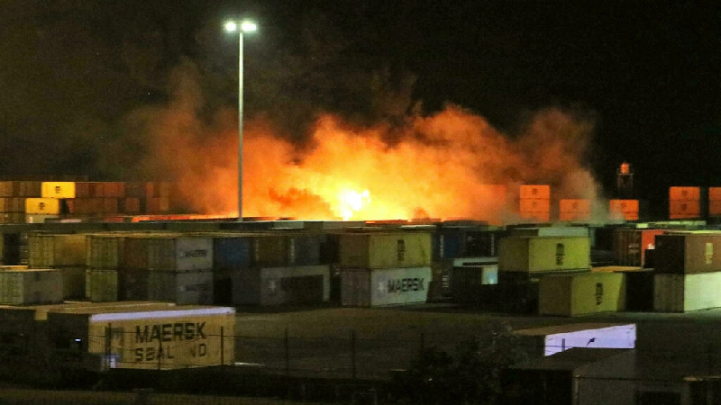 a fire blazes in the container yard of the syrian port of latakia after an israeli air strike targeting an iranian arms shipment photo afp