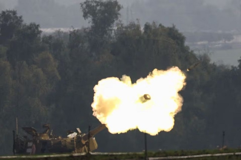 an israeli artillery unit fires near the israel gaza border in southern israel december 28 2023 photo reuters