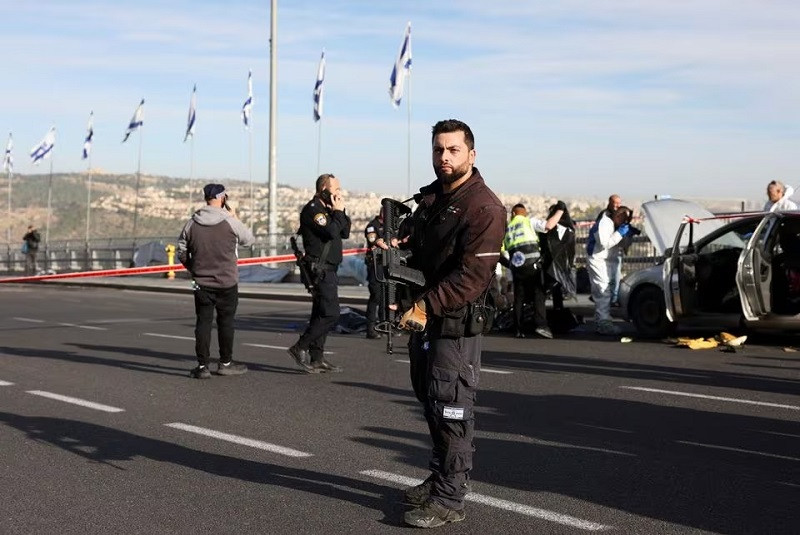 Israeli officials work during a stage of a aroused occurrence in Jerusalem Nov 30, 2023. PHOTO: REUTERS