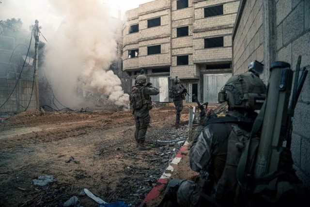 israeli soldiers operate in the gaza strip in this handout picture released on january 14 2024 photo reuters israeli soldiers operate in the gaza strip in this handout picture released on january 14 2024 photo reuters