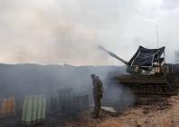 an israeli soldier stands by a mobile artillery unit near the israel lebanon border in northern israel january 15 2024 photo reuters