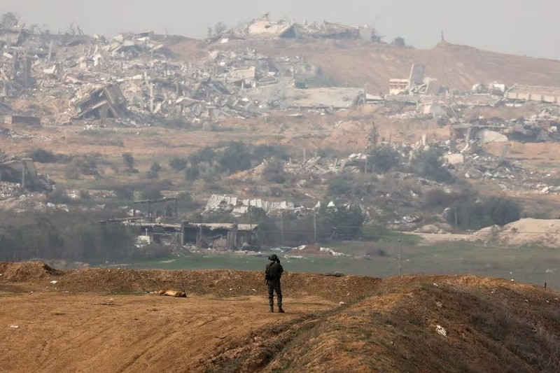 An Israeli soldier stands near the Israel-Gaza border in southern Israel, December 27, 2023. PHOTO: REUTERS
