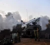israeli soldiers stand by as a mobile artillery unit fires on the israeli side of the israel lebanon border december 19 2023 photo reuters