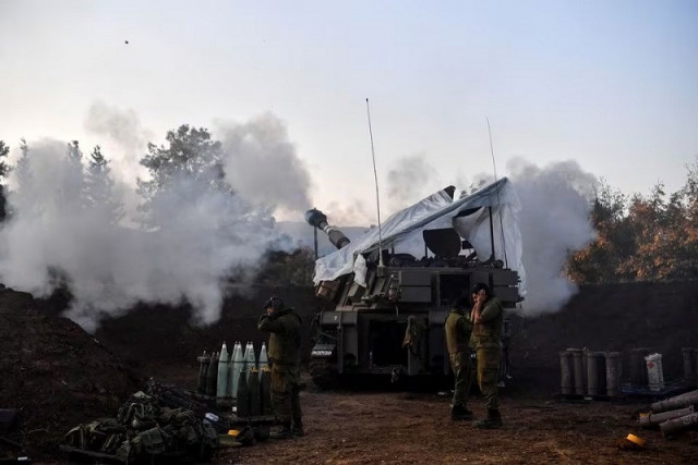 israeli soldiers stand by as a mobile artillery unit fires on the israeli side of the israel lebanon border december 19 2023 photo reuters israeli soldiers stand by as a mobile artillery unit fires on the israeli side of the israel lebanon border december 19 2023 photo reuters