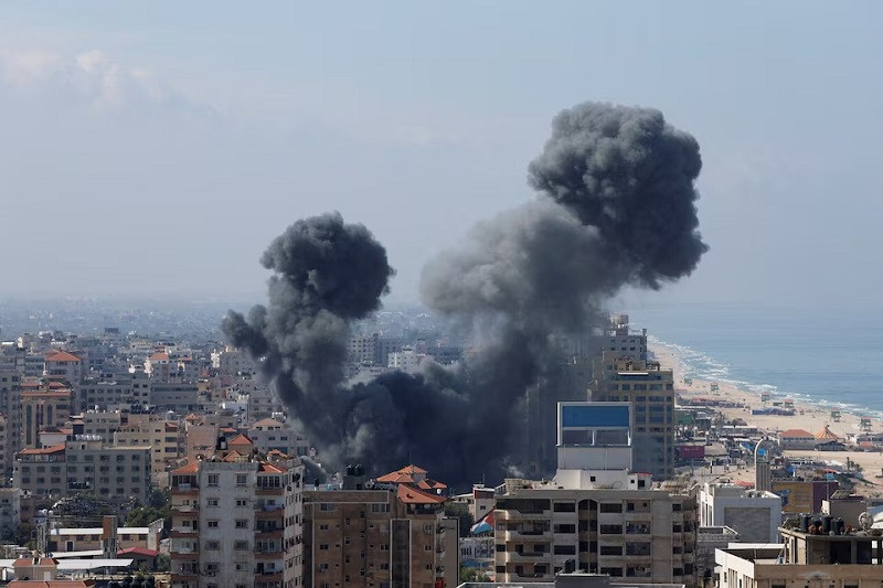 smoke rises following israeli strikes in gaza october 7 2023 photo reuters