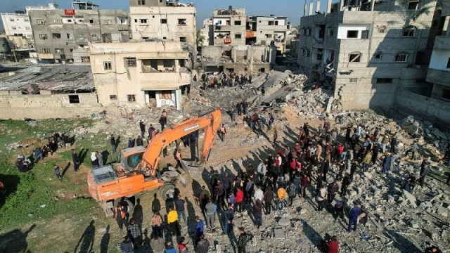palestinians gather at the site of an israeli strike on a house in rafah in the southern gaza strip december 19 2023 photo reuters
