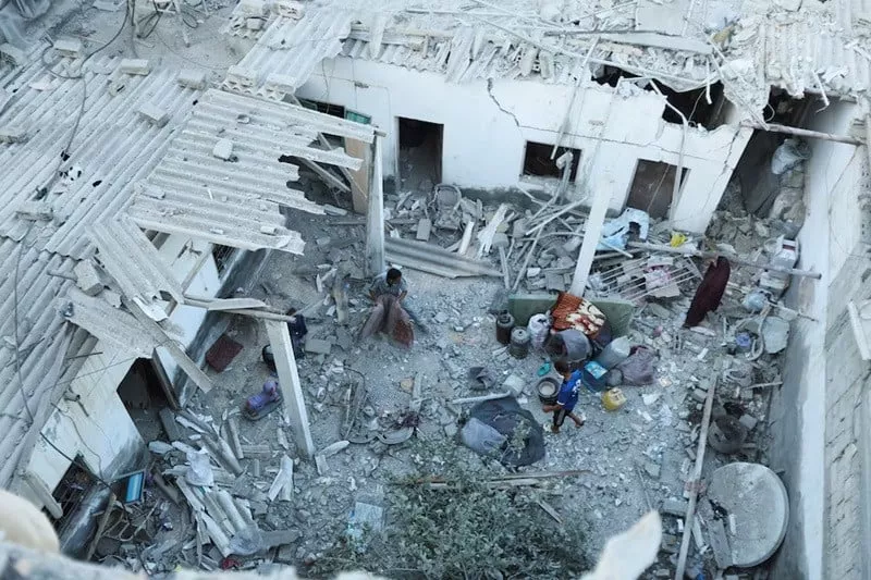 palestinians inspect the site of an israeli strike on a house in deir al balah in the central gaza strip august 4 2024 photo reuters palestinians inspect the site of an israeli strike on a house in deir al balah in the central gaza strip august 4 2024 photo reuters
