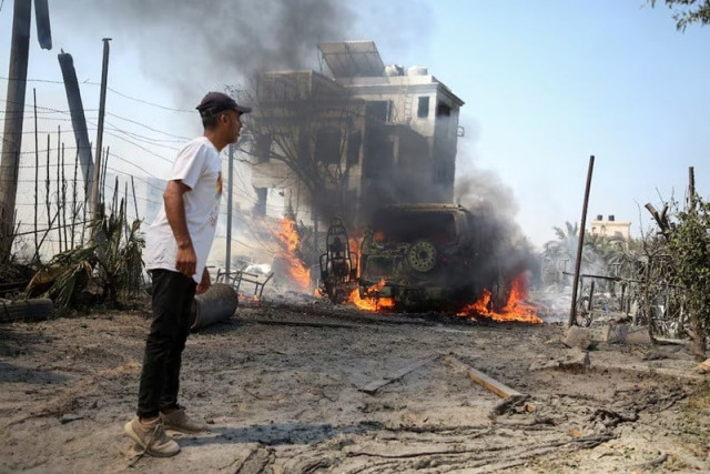 a man looks on at the site of an israeli strike at a tent camp in al mawasi area in khan younis in the southern gaza strip july 13 2024 photo reuters a man looks on at the site of an israeli strike at a tent camp in al mawasi area in khan younis in the southern gaza strip july 13 2024 photo reuters
