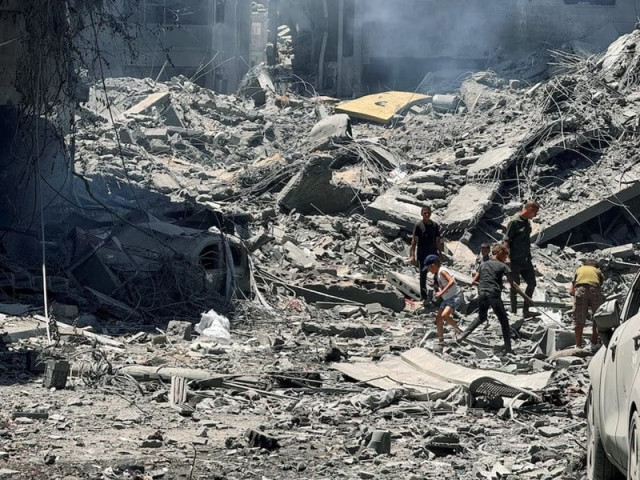 palestinians search for casualties at the site of israeli strikes on houses amid israel hamas conflict in gaza city june 22 2024 photo reuters palestinians search for casualties at the site of israeli strikes on houses amid israel hamas conflict in gaza city june 22 2024 photo reuters